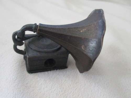 A VINTAGE METAL GRAMAPHONE PENCIL SHARPENER