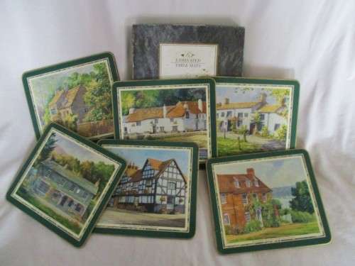 A BOXED SET OF SIX VINTAGE CLOVERLEAF  PLACEMATS /TABLE MATS DEPICTING OLD ENGLISH INNS