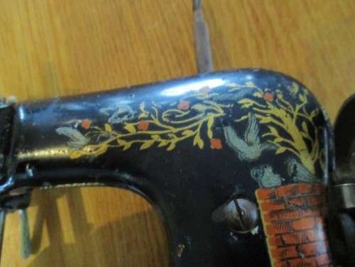 STRAIGHT OUT OF THE ATTIC!!  A VERY OLD ANTIQUE TIN PLATE TOY SEWING MACHINE