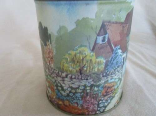 A SET OF TWO PRETTY COTTAGE-STYLE TINS