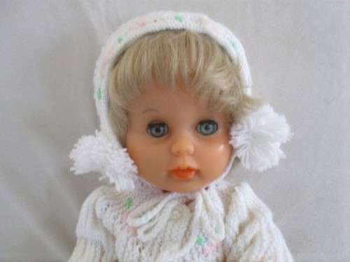 A 42CM TALL DRINK AND WET FIRST LOVE DOLL IN THE CUTEST HAND KNITTED OUTFIT