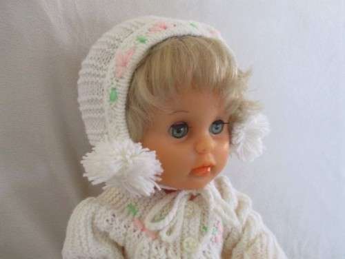 A 42CM TALL DRINK AND WET FIRST LOVE DOLL IN THE CUTEST HAND KNITTED OUTFIT