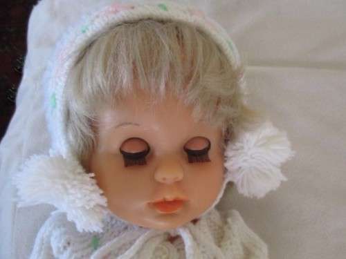 A 42CM TALL DRINK AND WET FIRST LOVE DOLL IN THE CUTEST HAND KNITTED OUTFIT