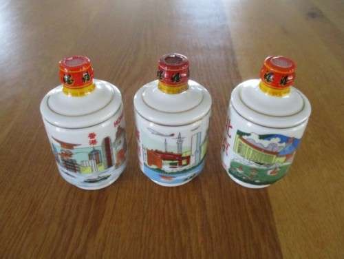 THREE MINIATURE PORCELAIN RICE WINE BOTTLES - STILL SEALED - SAM SENG WINE CO,. HONG KONG