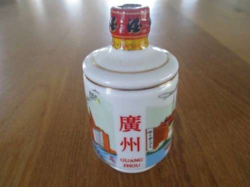 THREE MINIATURE PORCELAIN RICE WINE BOTTLES - STILL SEALED - SAM SENG WINE CO,. HONG KONG