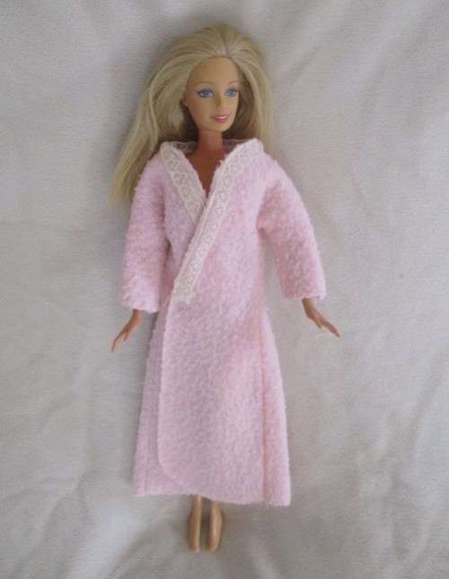 MATTEL BARBIE DOLL IN PJ`S AND GOWN AND WITH KNEES THAT BEND (PLUS EXTRA DRESS)