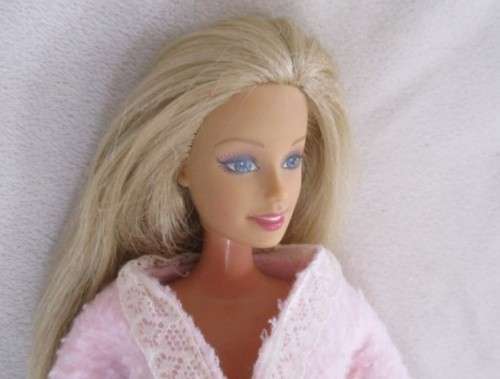 MATTEL BARBIE DOLL IN PJ`S AND GOWN AND WITH KNEES THAT BEND (PLUS EXTRA DRESS)