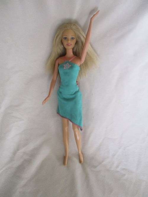 MATTEL BARBIE DOLL IN PJ`S AND GOWN AND WITH KNEES THAT BEND (PLUS EXTRA DRESS)