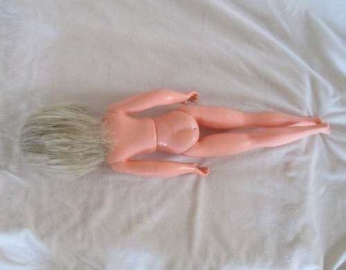 PRETTY VINTAGE 48CM TALL TEEN DOLL WITH TWISTY WAIST AND OPEN/CLOSE EYES