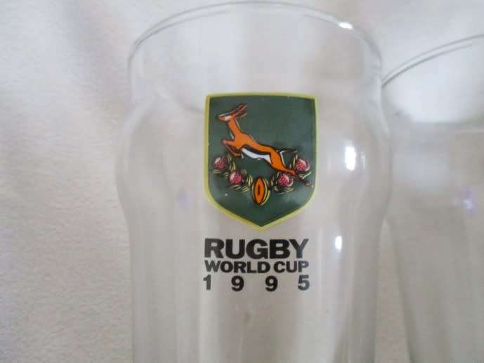 CELEBRATE WITH THIS SET OF 1995 WORLD CUP RUGBY GLASSES (SIXTEEN IN ORIGINAL BOX)