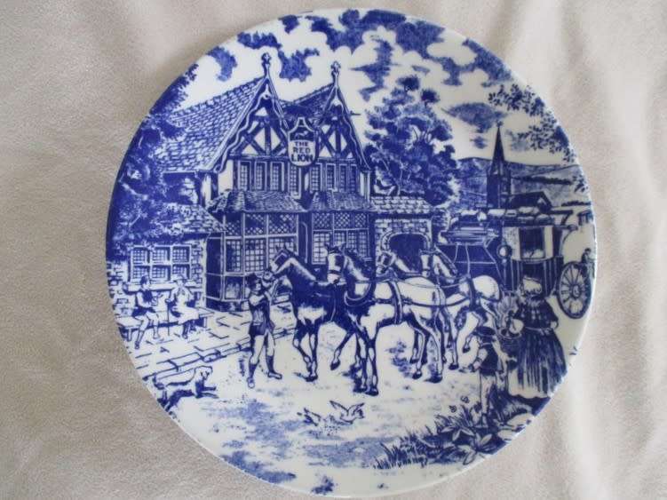 TWO CONSTANTIA FINE CHINA PLATES - THE RED LION - ONE BLUE AND WHITE AND ONE BROWN AND WHITE