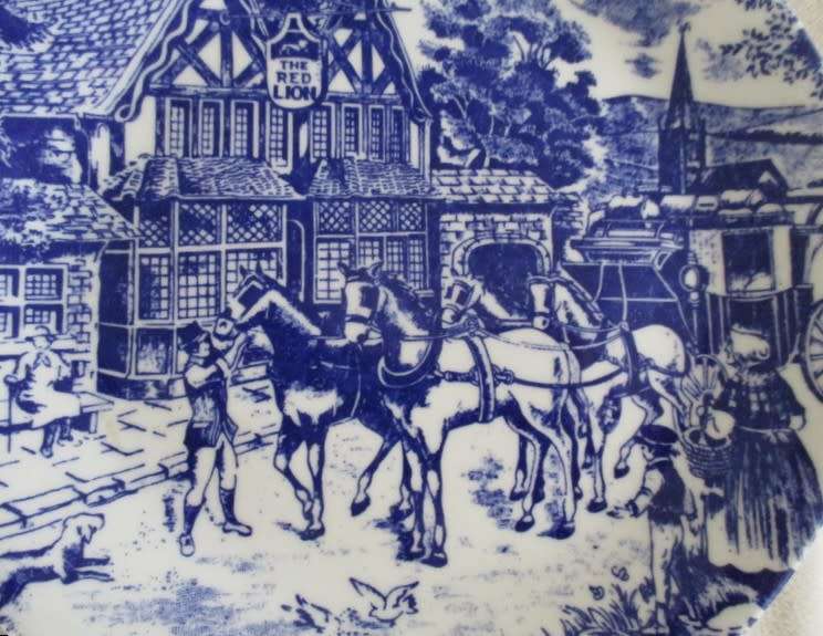 TWO CONSTANTIA FINE CHINA PLATES - THE RED LION - ONE BLUE AND WHITE AND ONE BROWN AND WHITE