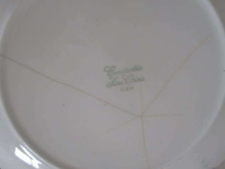 TWO CONSTANTIA FINE CHINA PLATES - THE RED LION - ONE BLUE AND WHITE AND ONE BROWN AND WHITE