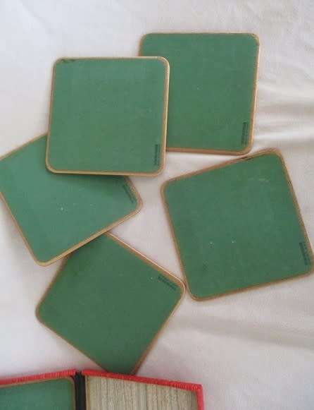A SET OF SIX QUALITY WIN-EL-WARE PLACEMATS IN ORIGINAL CANISTER