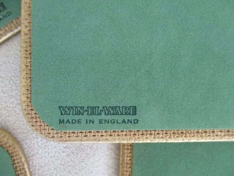 A SET OF SIX QUALITY WIN-EL-WARE PLACEMATS IN ORIGINAL CANISTER