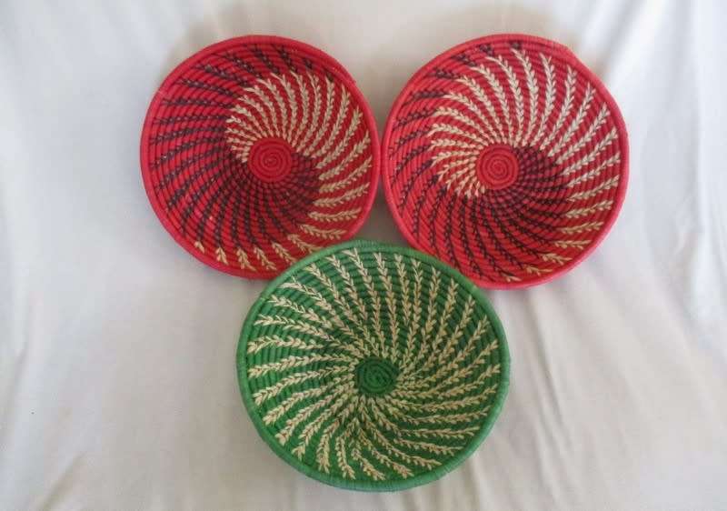 THREE COLOURFUL AFRICAN WOVEN  WALL/TABLE ART BASKETS