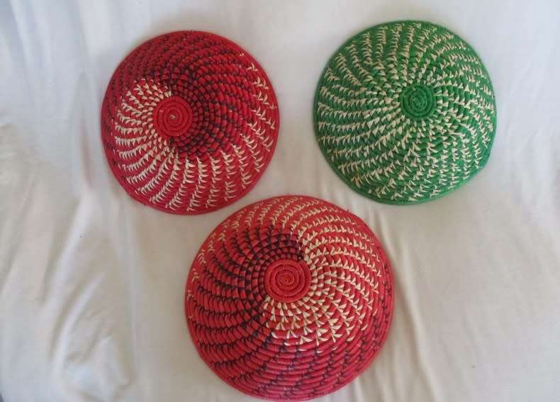 THREE COLOURFUL AFRICAN WOVEN  WALL/TABLE ART BASKETS