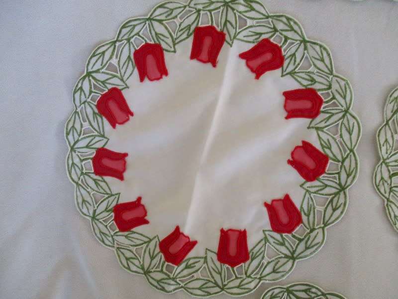 A set of five cloths - appliqued and embroidered with pretty Dutch tulips