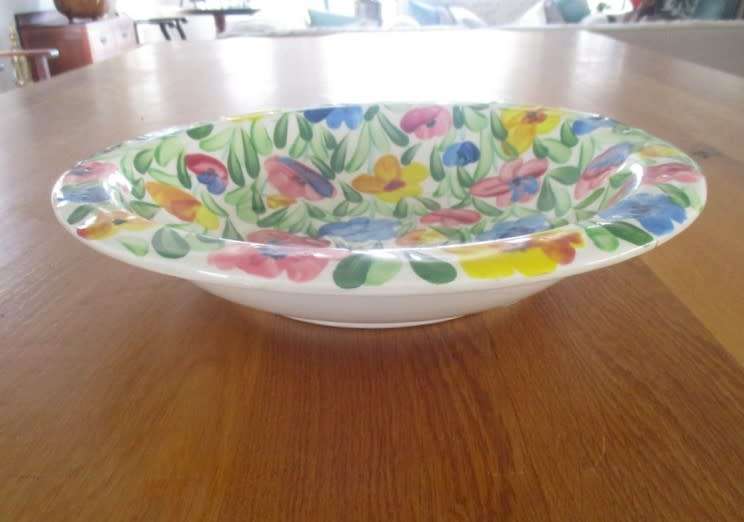 Large hand painted bowl with cheerful floral design