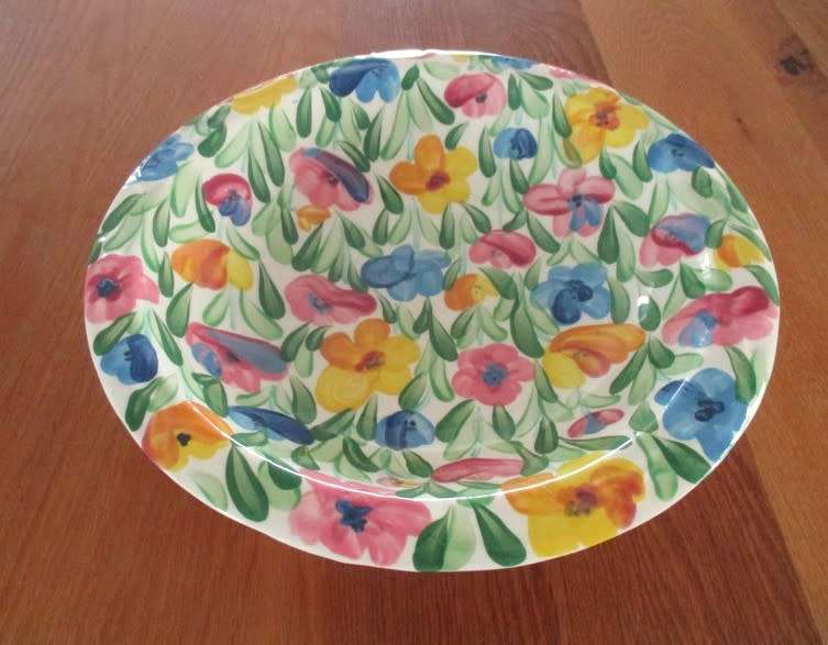 Large hand painted bowl with cheerful floral design