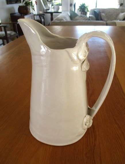 Very large Di Marshall Wonki Ware jug with raised floral touches