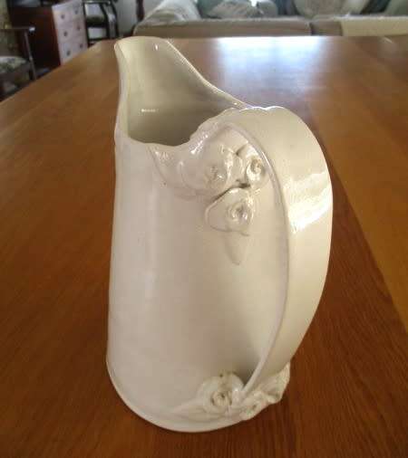 Very large Di Marshall Wonki Ware jug with raised floral touches