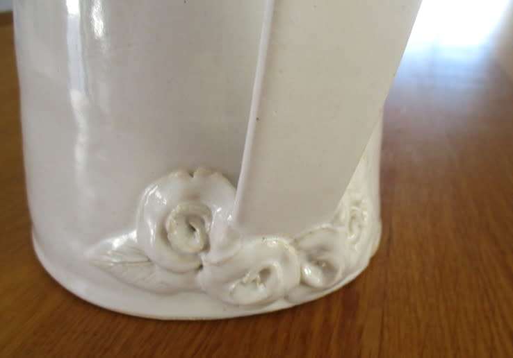 Very large Di Marshall Wonki Ware jug with raised floral touches