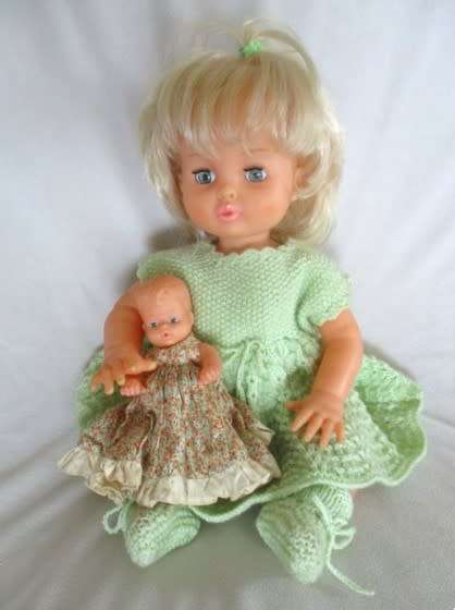 Beautiful First Love Baby Love twisty body doll holding her own vintage dolly