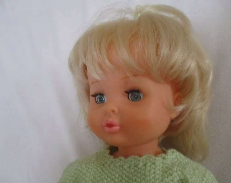 Beautiful First Love Baby Love twisty body doll holding her own vintage dolly