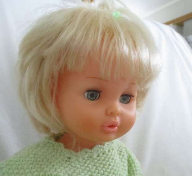 Beautiful First Love Baby Love twisty body doll holding her own vintage dolly