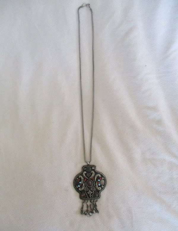 Unusual Aztec design pendant and chain