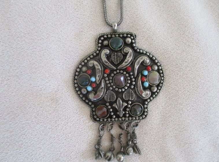 Unusual Aztec design pendant and chain