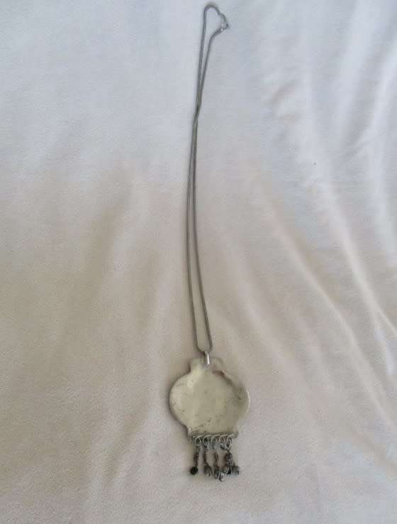 Unusual Aztec design pendant and chain
