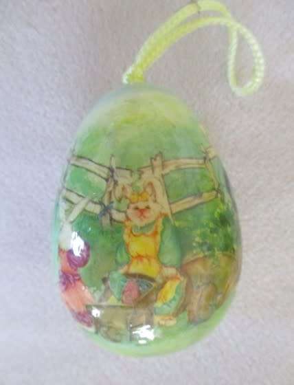 From days gone by.  Six vintage decoupaged Easter eggs with cute bunny rabbit scenes