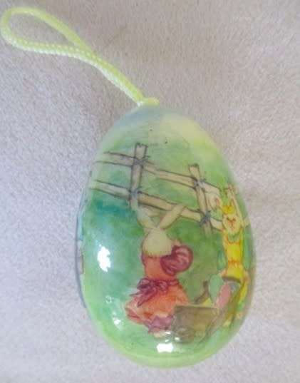 From days gone by.  Six vintage decoupaged Easter eggs with cute bunny rabbit scenes
