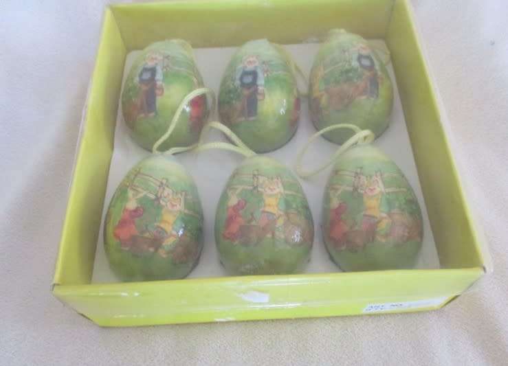 From days gone by.  Six vintage decoupaged Easter eggs with cute bunny rabbit scenes