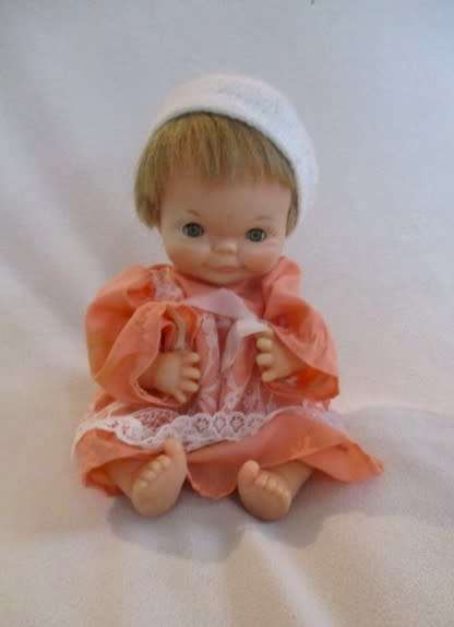 As cute as a button - small vintage 1960`s Chiltern doll with cheeky smile