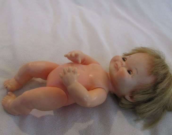 As cute as a button - small vintage 1960`s Chiltern doll with cheeky smile