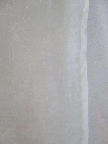 A stunning large, gossamer cloth with pretty beaded tassels