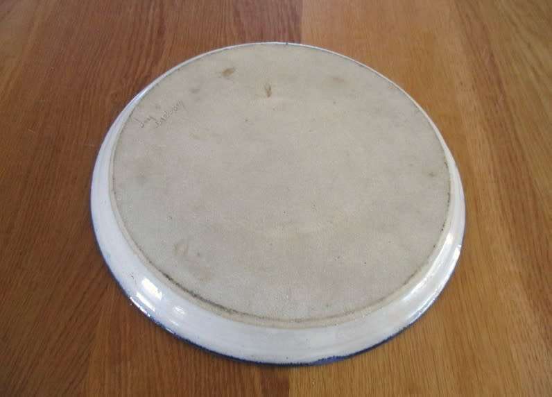Beautiful vintage blue and white art pottery plate by South African ceramist, Joy Webber