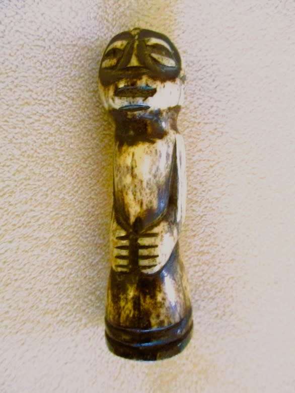 Two very old carved bone Luba/Songwe, Congo potion holders/talismans with original stoppers