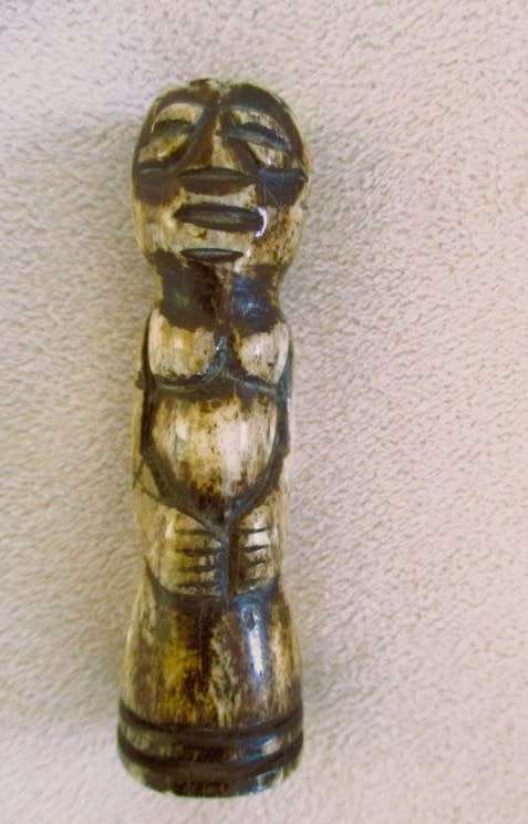 Two very old carved bone Luba/Songwe, Congo potion holders/talismans with original stoppers