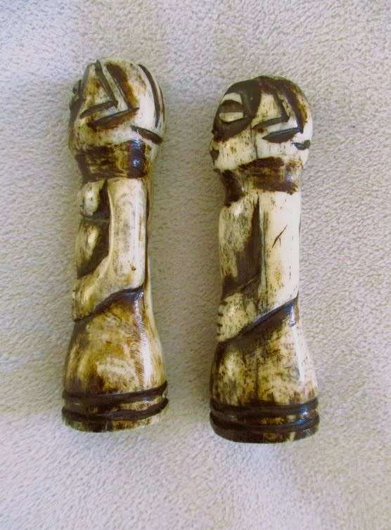 Two very old carved bone Luba/Songwe, Congo potion holders/talismans with original stoppers