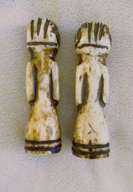 Two very old carved bone Luba/Songwe, Congo potion holders/talismans with original stoppers