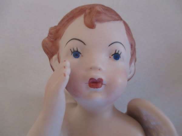 Larger than most -  a trio of adorable vintage hand painted ceramic cherubs - Scioto?