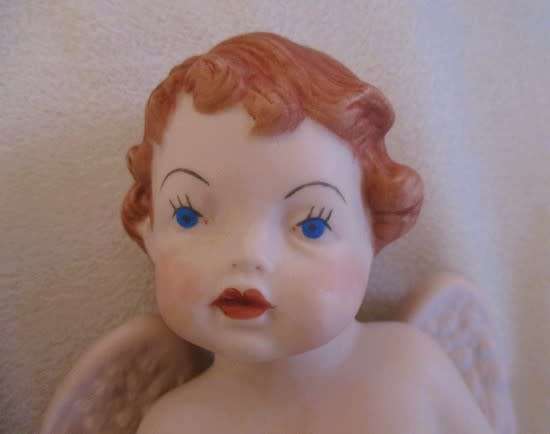 Larger than most -  a trio of adorable vintage hand painted ceramic cherubs - Scioto?
