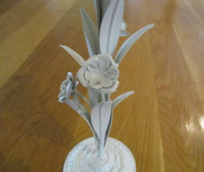Tall painted metal candle holder with lovely floral detail