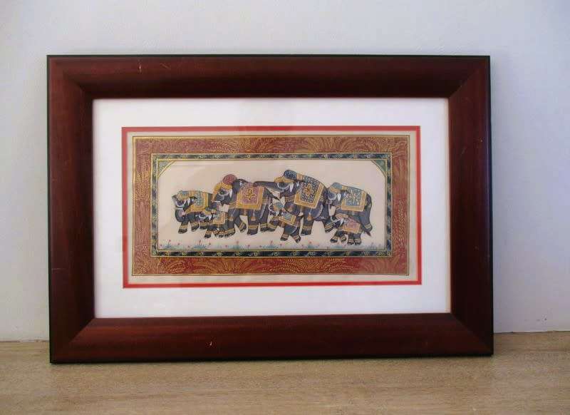 Hand painted Indian artwork - solid wood frame - row of decorative elephants with gilt highlights
