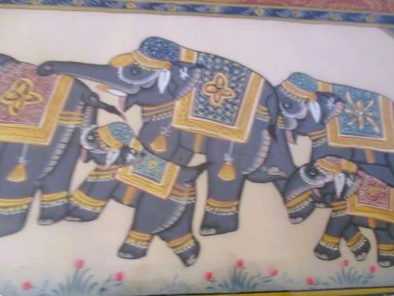 Hand painted Indian artwork - solid wood frame - row of decorative elephants with gilt highlights