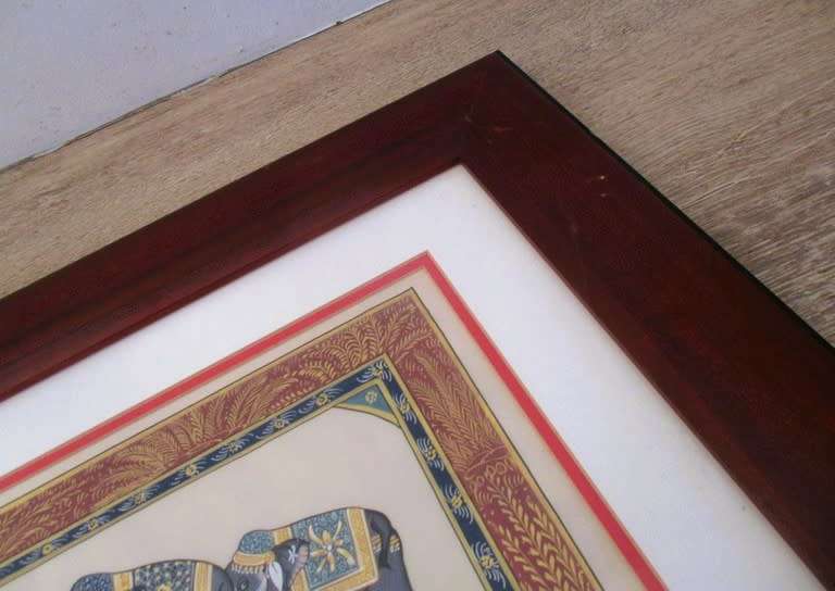 Hand painted Indian artwork - solid wood frame - row of decorative elephants with gilt highlights